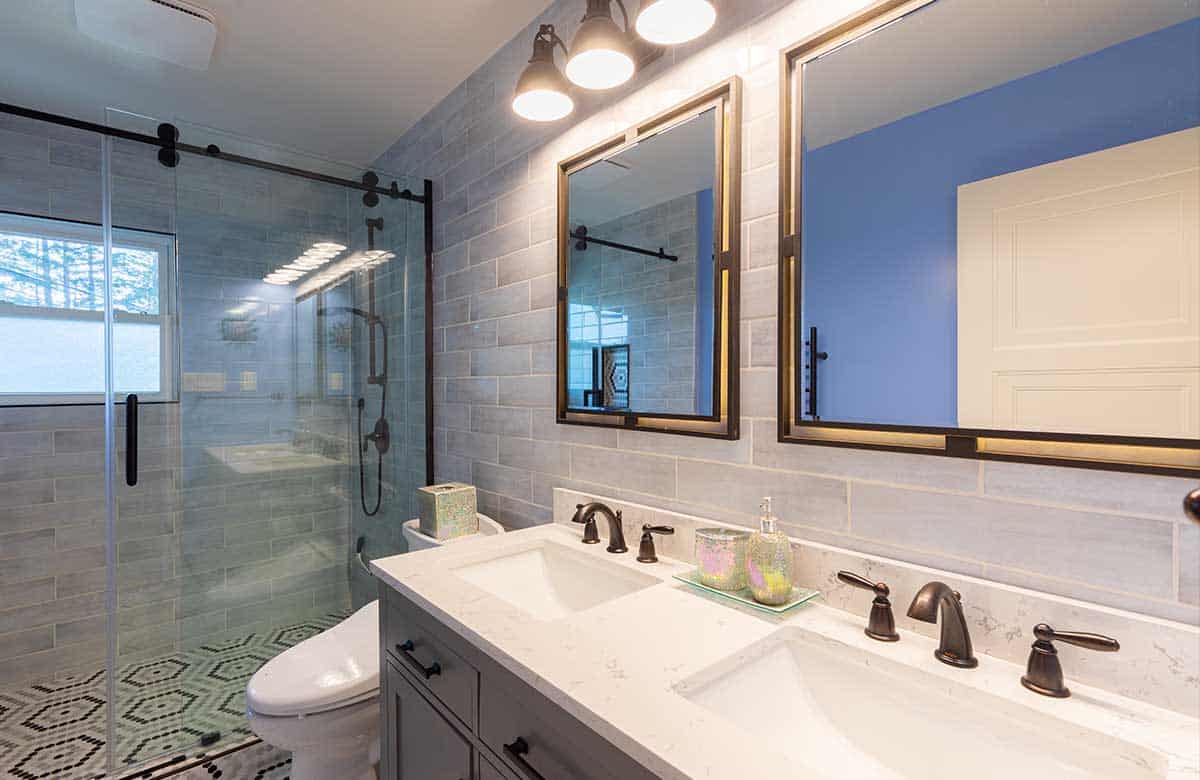 Powder-room-with-eggplant-colored-tile-and-dramatic-lighting