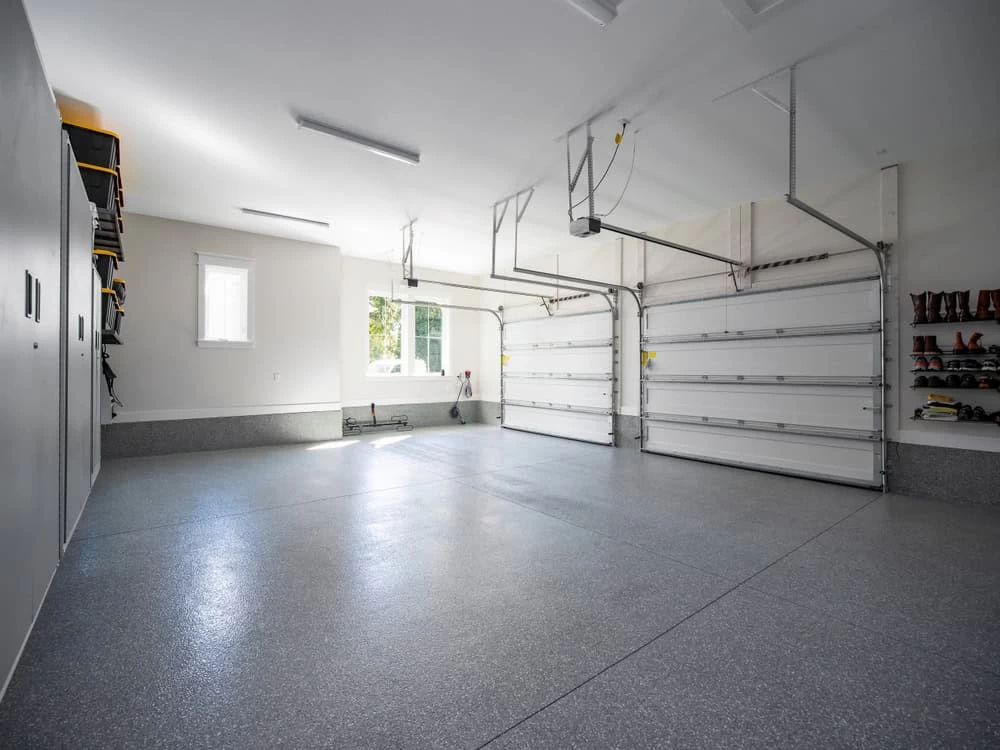A garage with two doors and a garage door opener in Contra Costa County, CA.