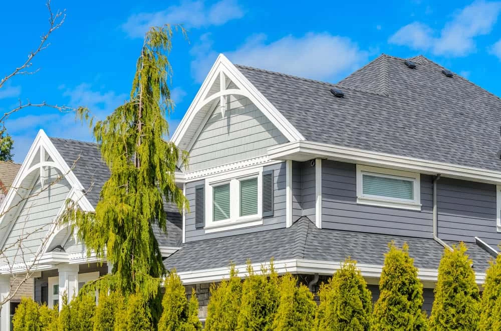 Modern home remodeling in Contra Costa County featuring gray siding and white trim
