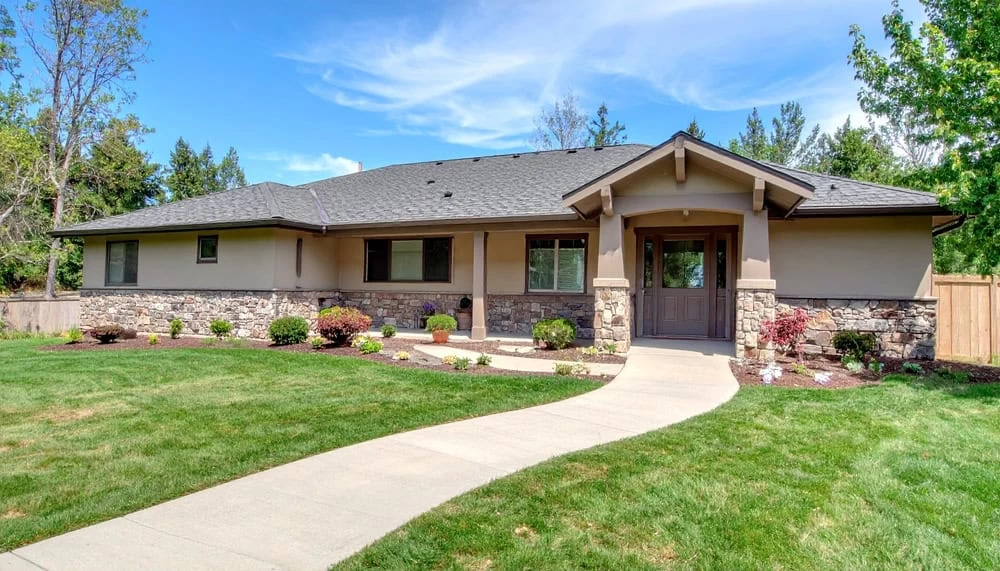 Beautiful Craftsman-style ranch home remodeling in Contra Costa County with stone accents and landscaping