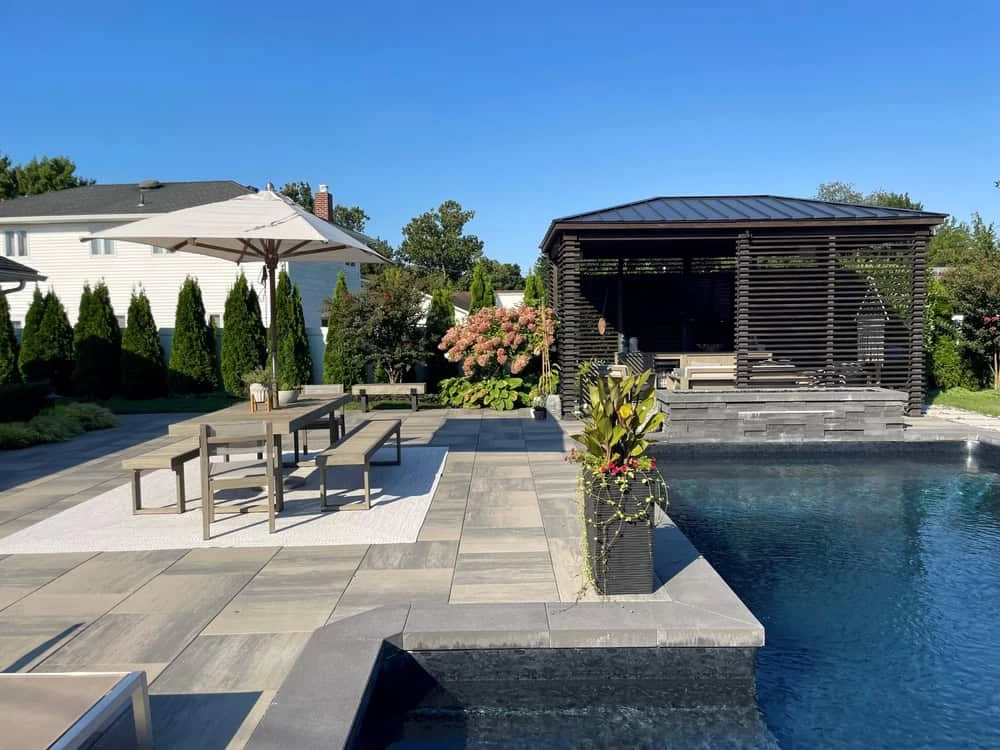 Outdoor home remodeling in Contra Costa County featuring a luxury backyard patio with pergola and lounge.